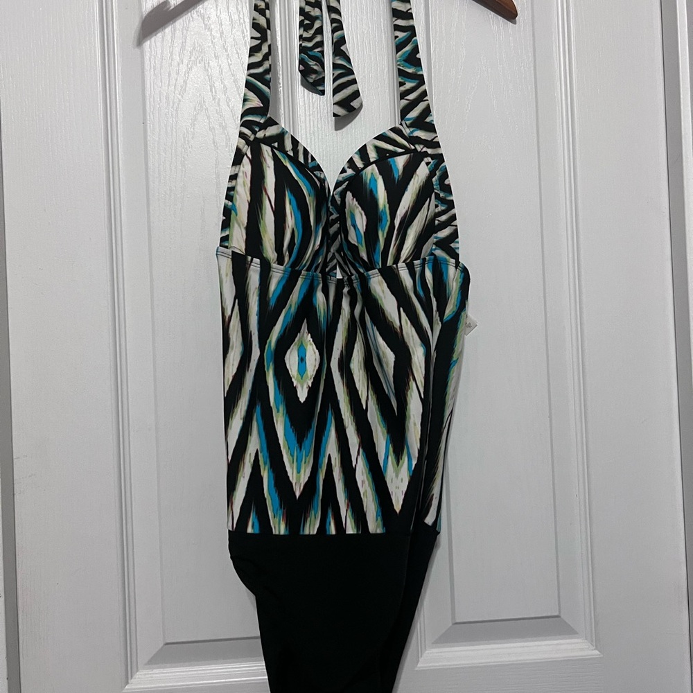 Leilani one piece swimsuit with halter ties around the neck. Size 10